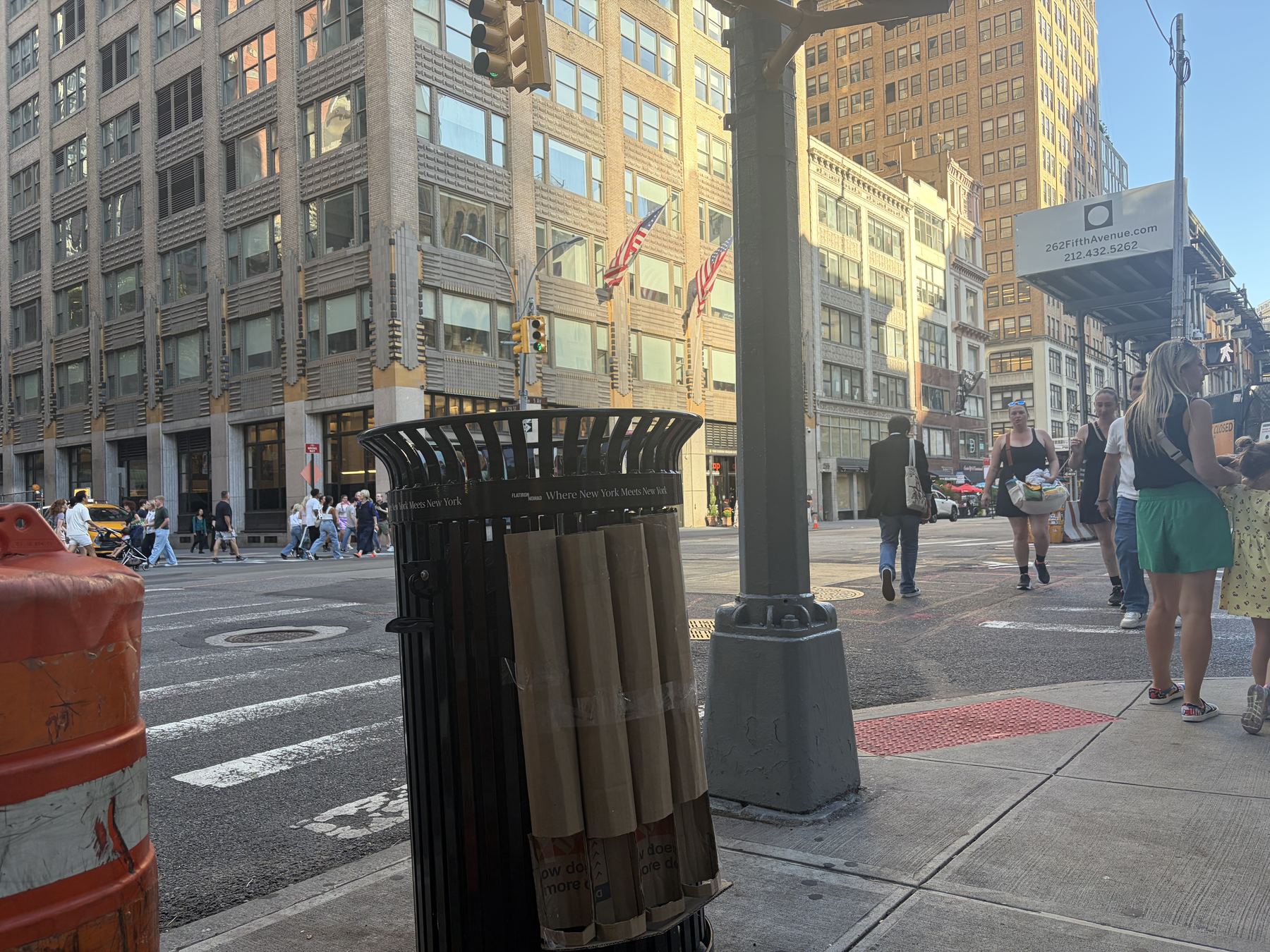 The Deposit Rack installed on a litter basket at a Flatiron intersection