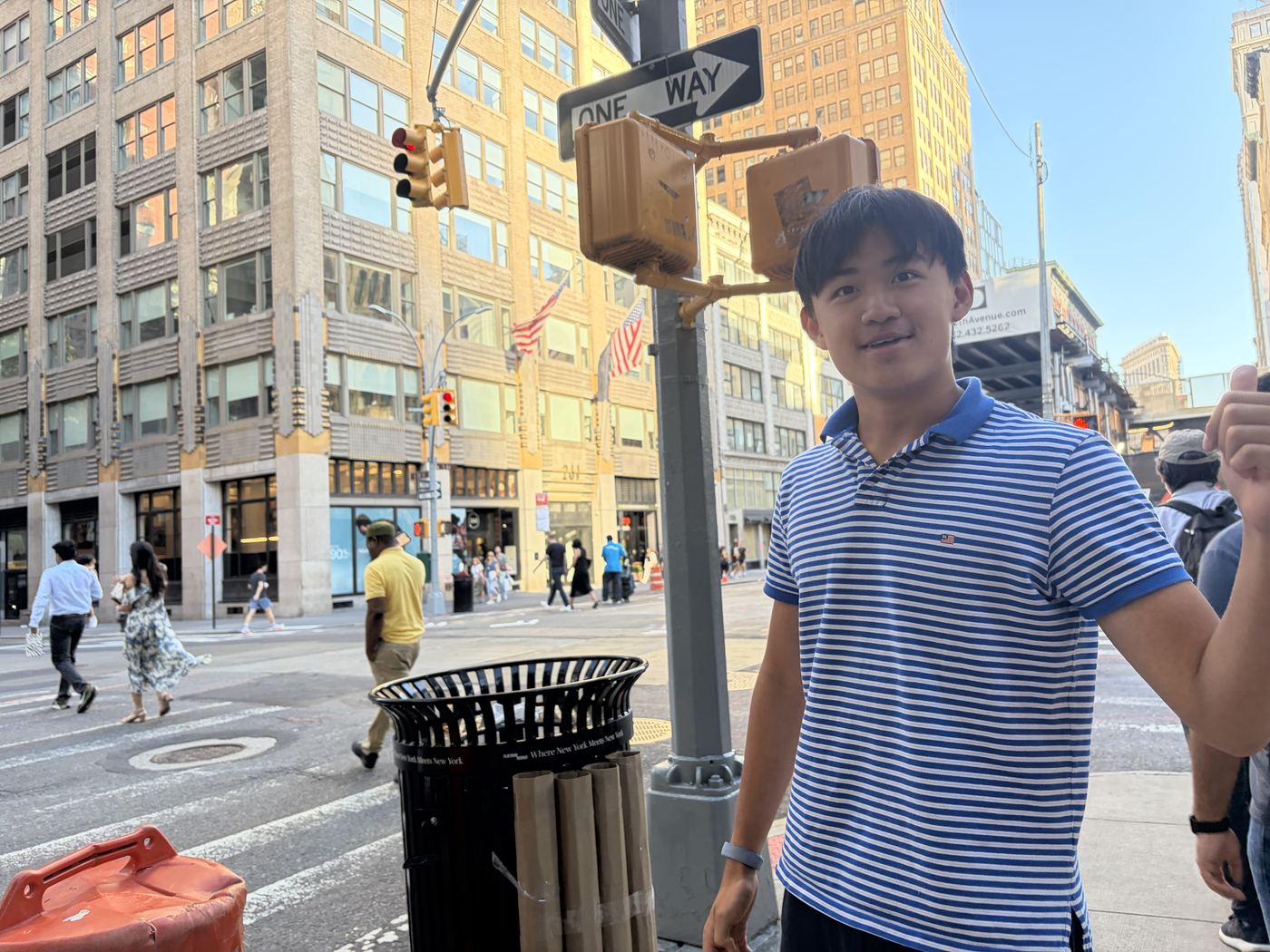 Edin Cheng standing beside the installed Deposit Rack in Flatiron